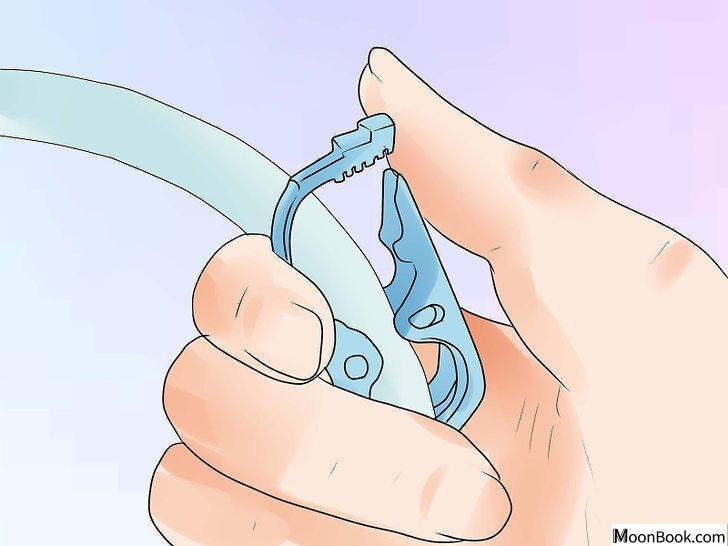 以Perform an Enema at Home Step 11为标题的图片